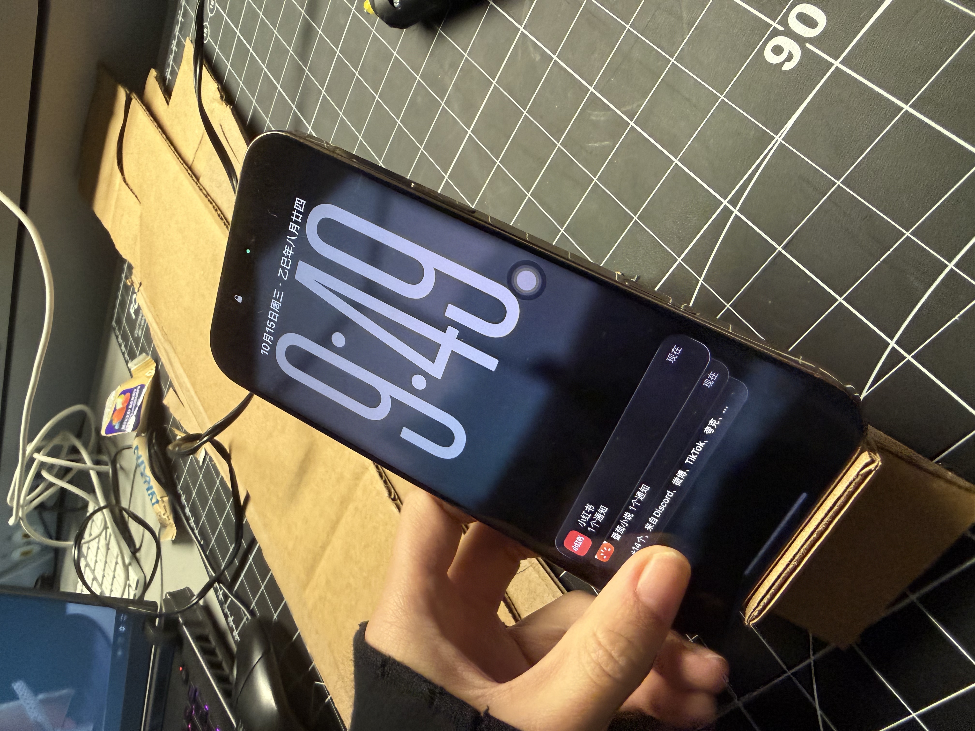 I created a basic cardboard stand to test the stability of the phone at a shallow angle.